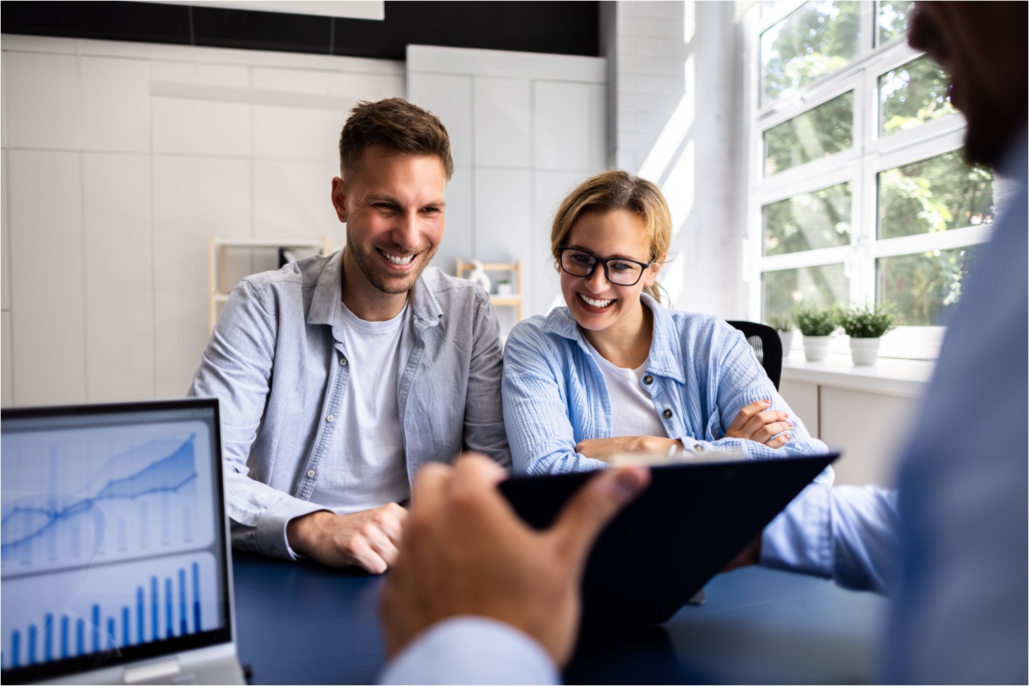 A couple working with a financial planner.